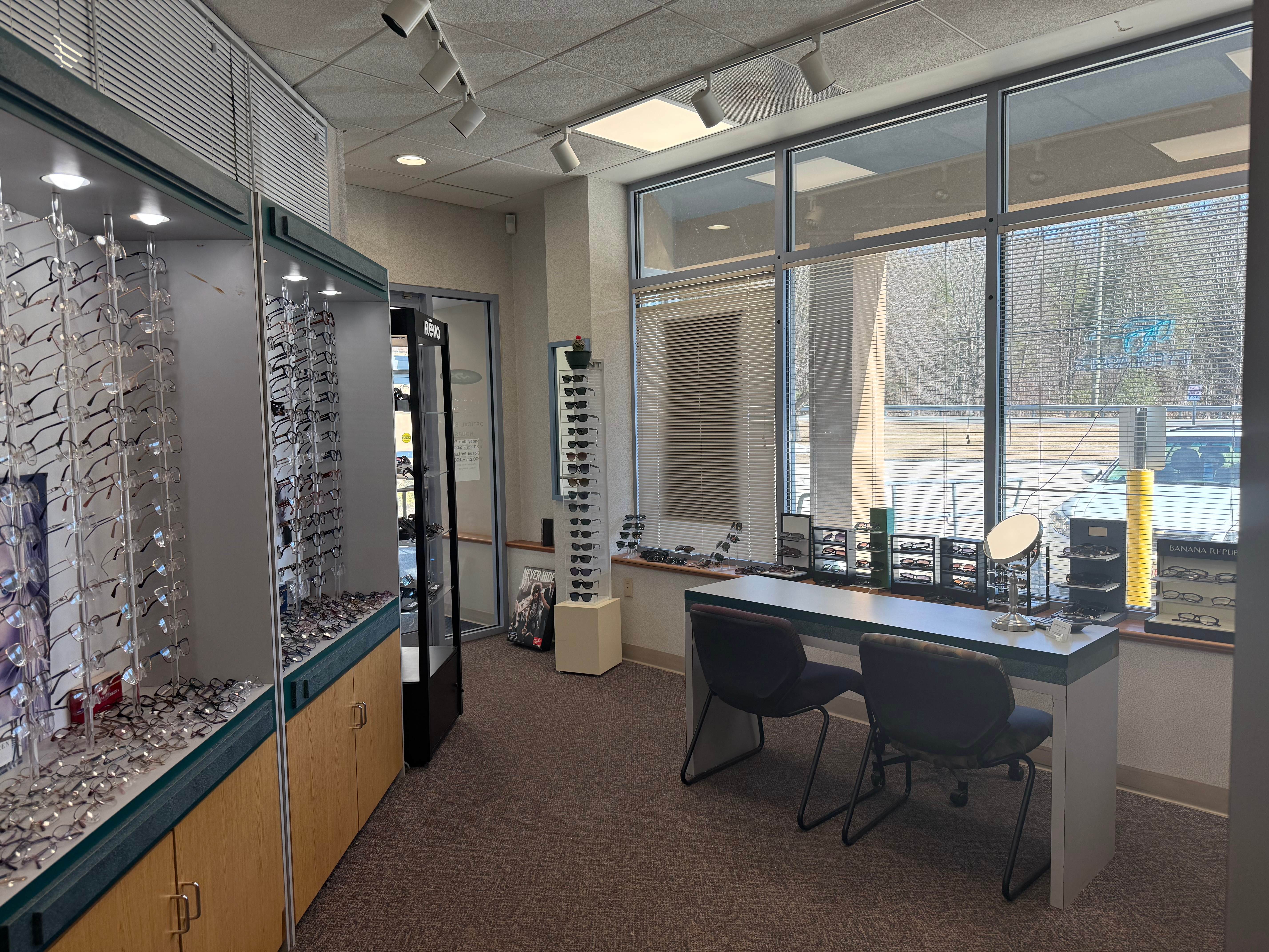 Modern eyewear showroom with natural lighting and organized displays